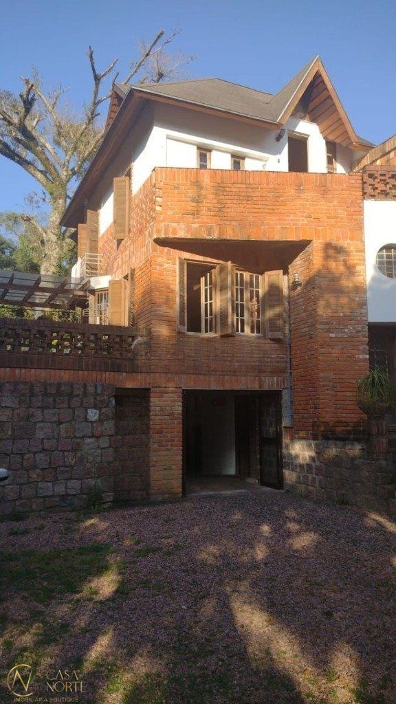 Casa à venda com 2 quartos, 181m², 2 suítes, 10 vagas, Rua Comendador José Julio de Mello no bairro Teresópolis em Porto Alegre