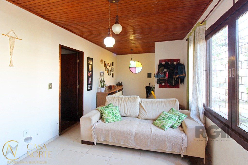 Casa à venda com 3 quartos, 168m², 2 vagas, Rua Engenheiro Jorge Porto no bairro Ipanema em Porto Alegre