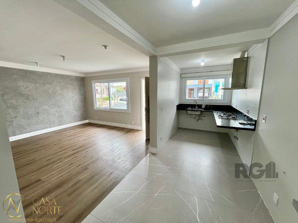 Casa à venda com 2 quartos, 95m², 1 suíte, 2 vagas, Rua Corticeira no bairro Hípica em Porto Alegre