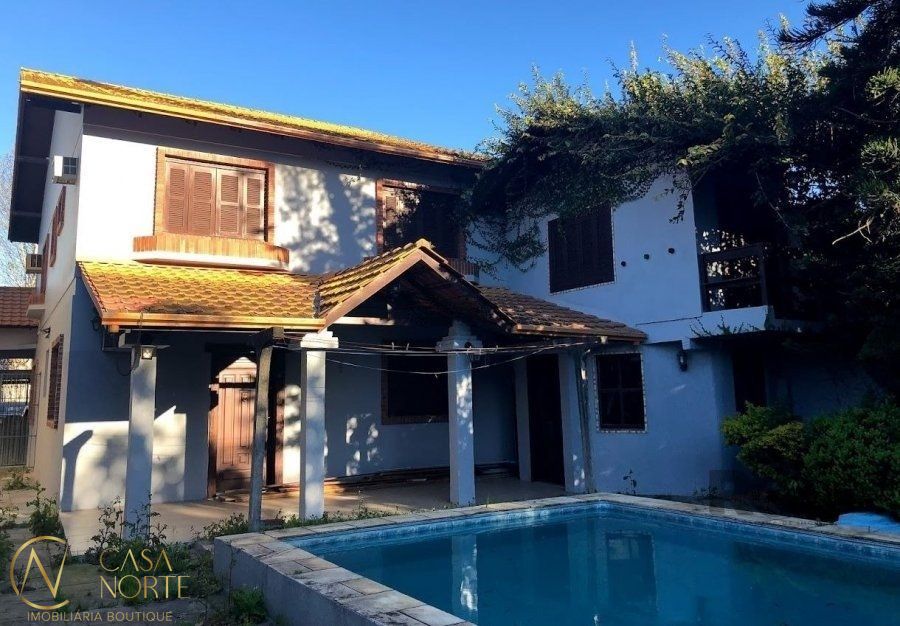 Casa à venda com 4 quartos, 365m², 3 suítes, 5 vagas, Rua Paulino Azurenha no bairro Partenon em Porto Alegre