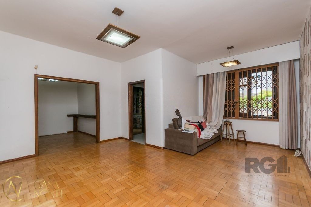 Casa à venda com 3 quartos, 150m², 1 suíte, 2 vagas, Rua Marcelo Gama no bairro Auxiliadora em Porto Alegre