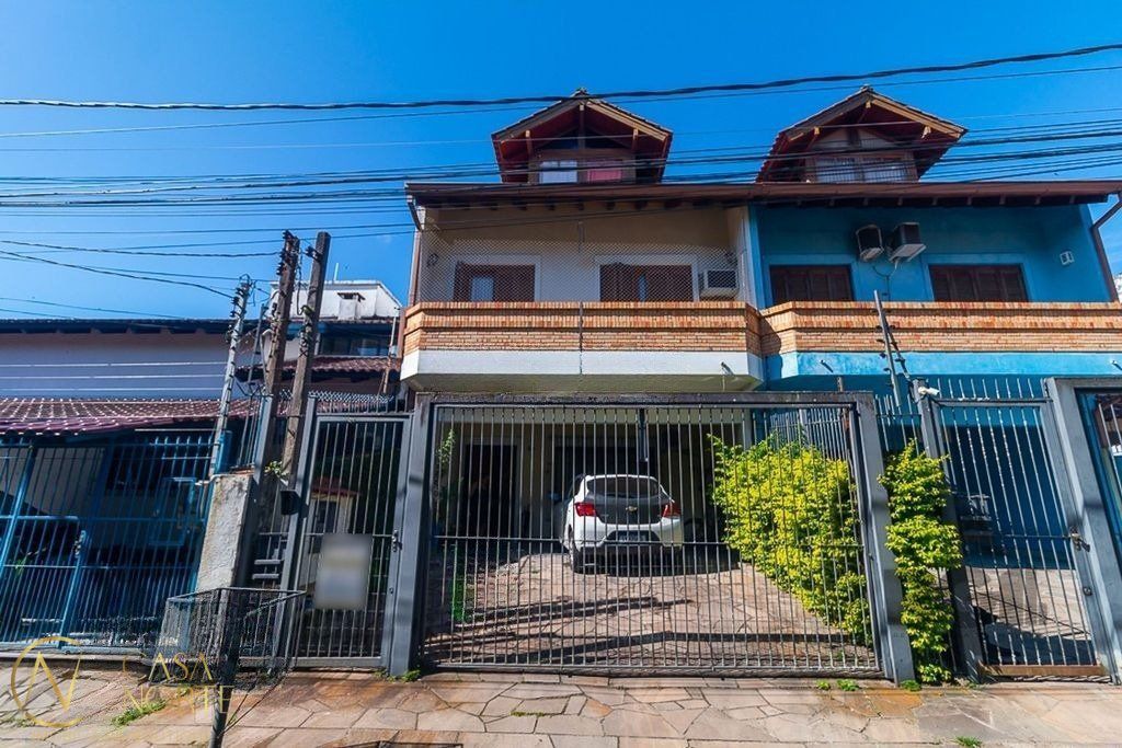 Casa à venda com 5 quartos, 164m², 2 vagas, Rua Doutor Pio Ângelo no bairro Ipanema em Porto Alegre