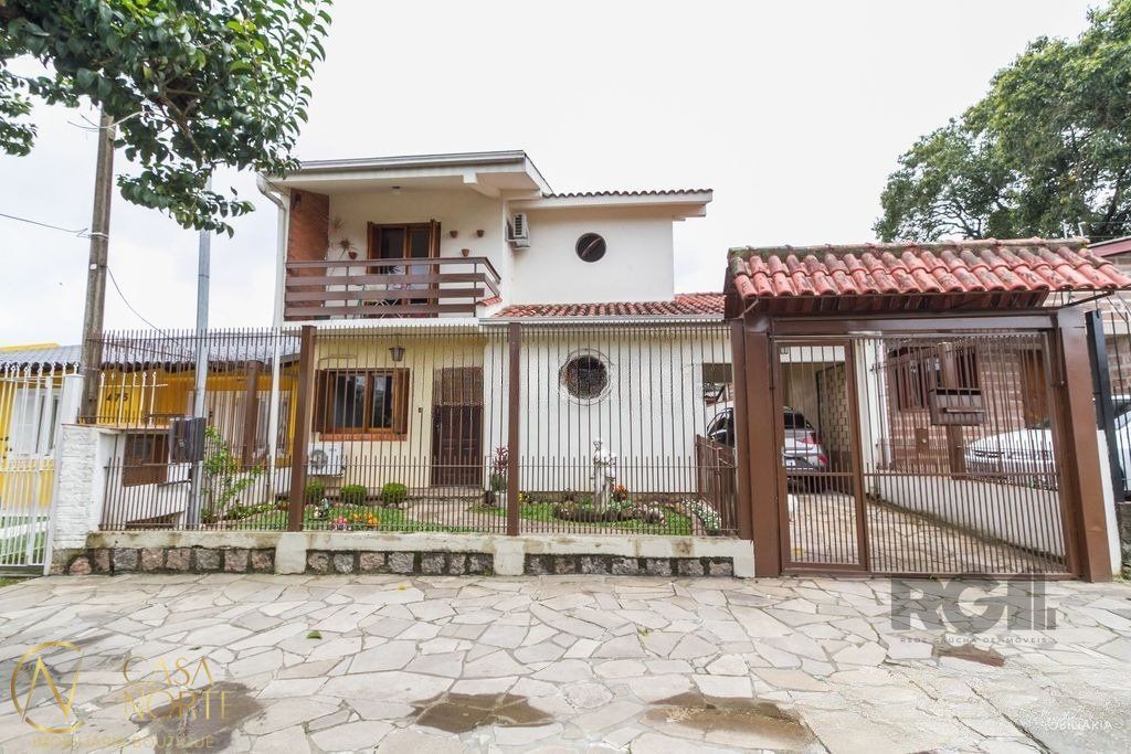 Casa à venda com 4 quartos, 207m², 1 suíte, 6 vagas, Rua Doutor Hermes Pacheco no bairro Aberta dos Morros em Porto Alegre