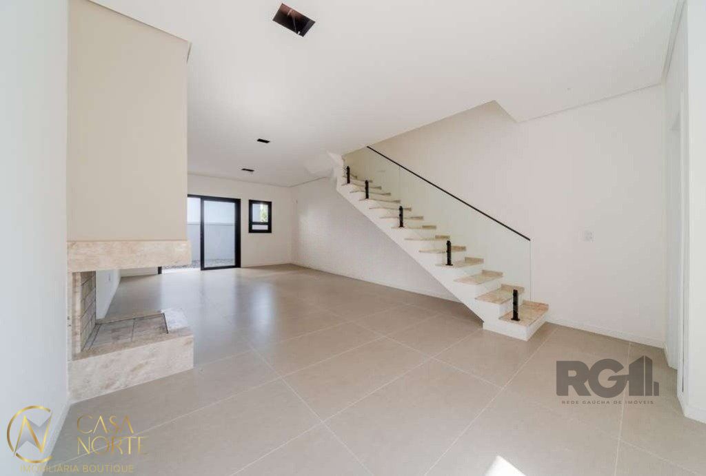 Casa à venda com 3 quartos, 121m², 1 suíte, 2 vagas, Rua Álamo no bairro Hípica em Porto Alegre