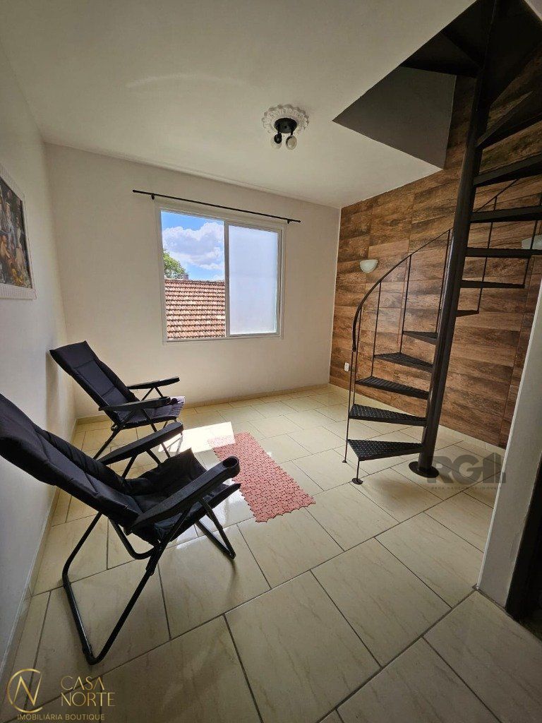Casa à venda com 11 quartos, 338m², 3 suítes, 4 vagas, Rua Oscar Tollens no bairro Santa Tereza em Porto Alegre