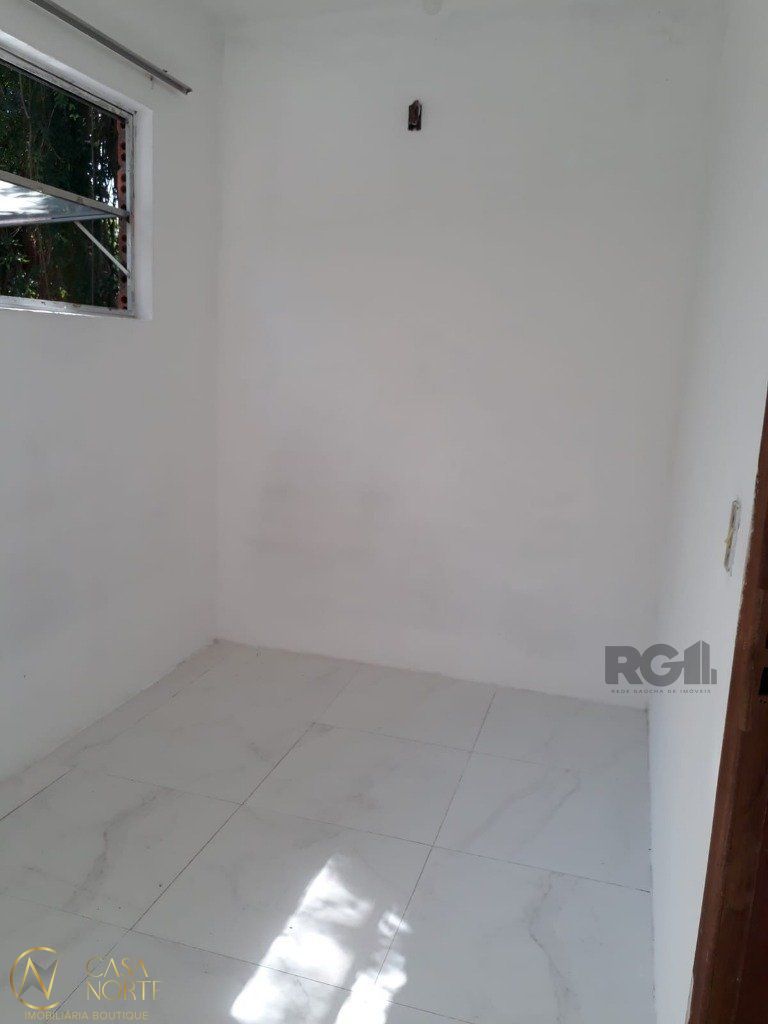 Casa à venda com 4 quartos, 180m², 2 suítes, 2 vagas, Avenida Cruz Alta no bairro Nonoai em Porto Alegre