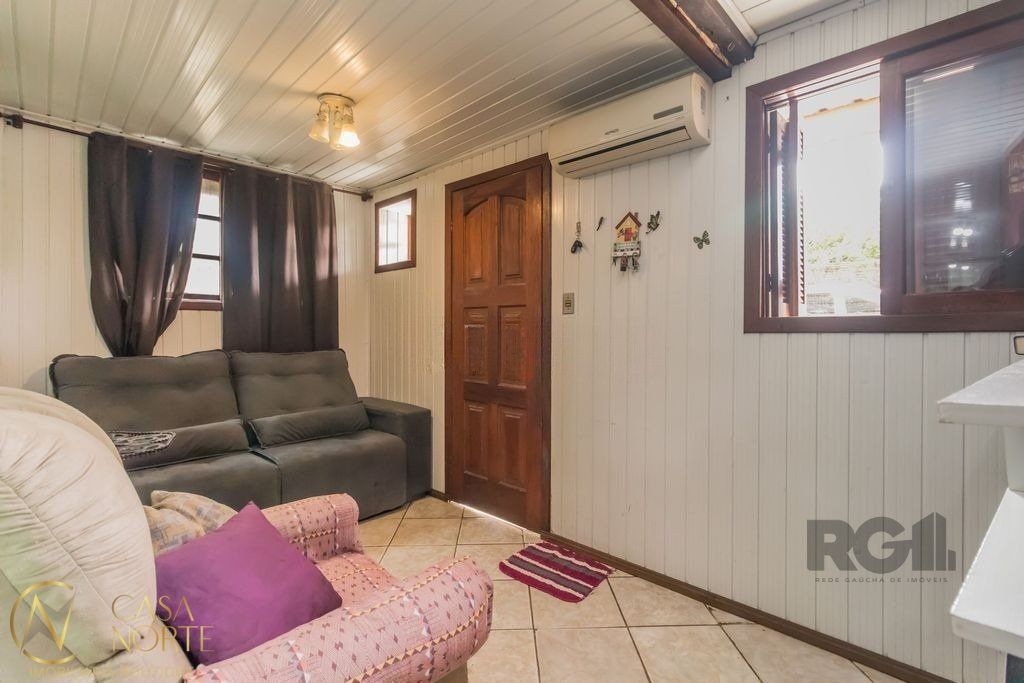 Casa à venda com 4 quartos, 224m², 2 vagas, Avenida Ipê no bairro Vila Jardim em Porto Alegre