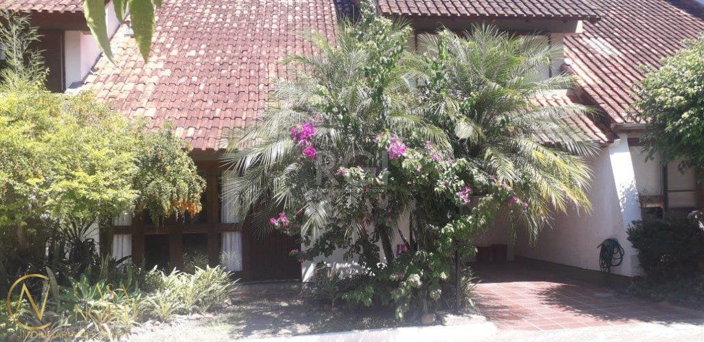 Casa de Condomínio à venda com 5 quartos, 220m², 2 suítes, 2 vagas, Rua Dea Coufal no bairro Ipanema em Porto Alegre