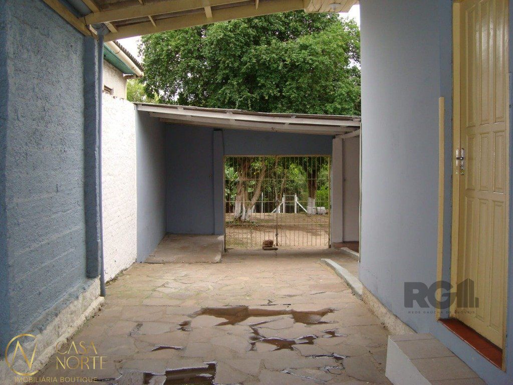 Casa à venda com 2 quartos, 1234m², 5 vagas, Rua Dário Totta no bairro Teresópolis em Porto Alegre