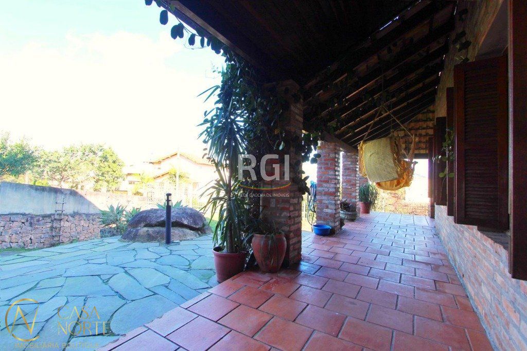 Casa à venda com 4 quartos, 269m², 2 suítes, 5 vagas, Rua Dona Lida Monteiro no bairro Teresópolis em Porto Alegre