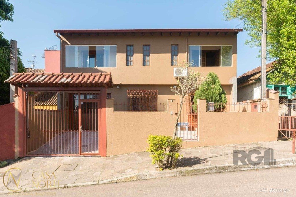 Casa à venda com 4 quartos, 265m², 2 suítes, 3 vagas, Rua Adroaldo Novo Correa no bairro Cavalhada em Porto Alegre