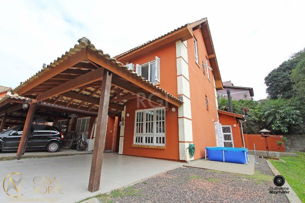 Casa de Condomínio à venda com 4 quartos, 149m², 1 suíte, 2 vagas, Rua Sepe Tiaraju no bairro Medianeira em Porto Alegre