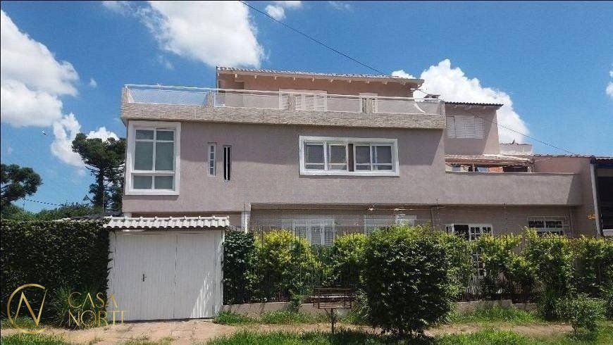 Casa à venda com 5 quartos, 188m², 2 suítes, 4 vagas, Rua Waldomiro Schapke no bairro Partenon em Porto Alegre
