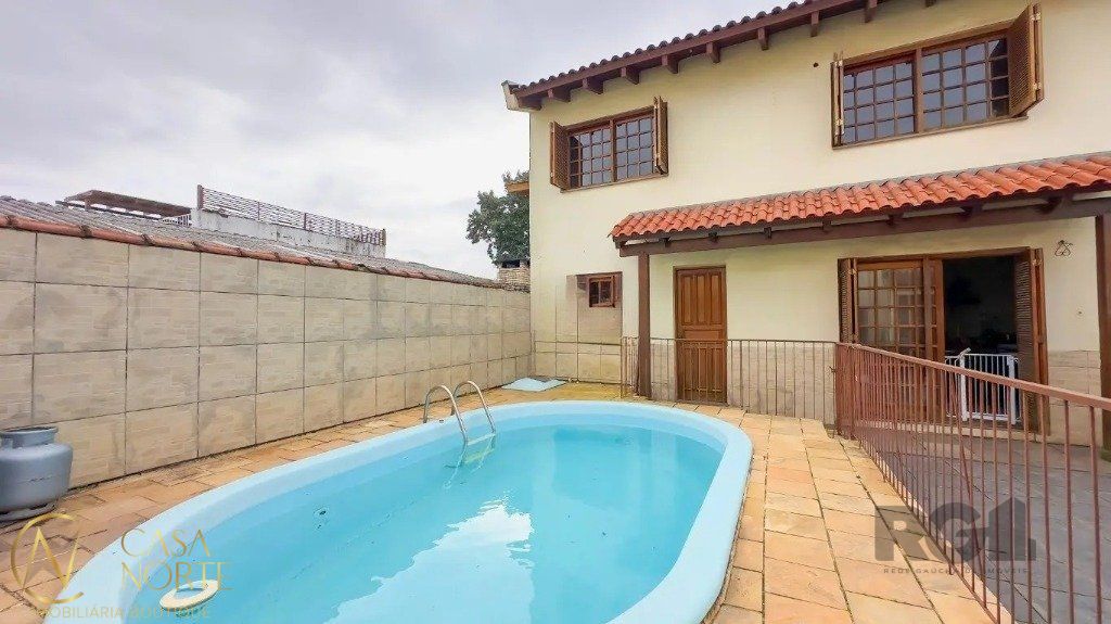 Casa à venda com 4 quartos, 371m², 3 suítes, 2 vagas, Rua Gregório da Fonseca no bairro Nonoai em Porto Alegre