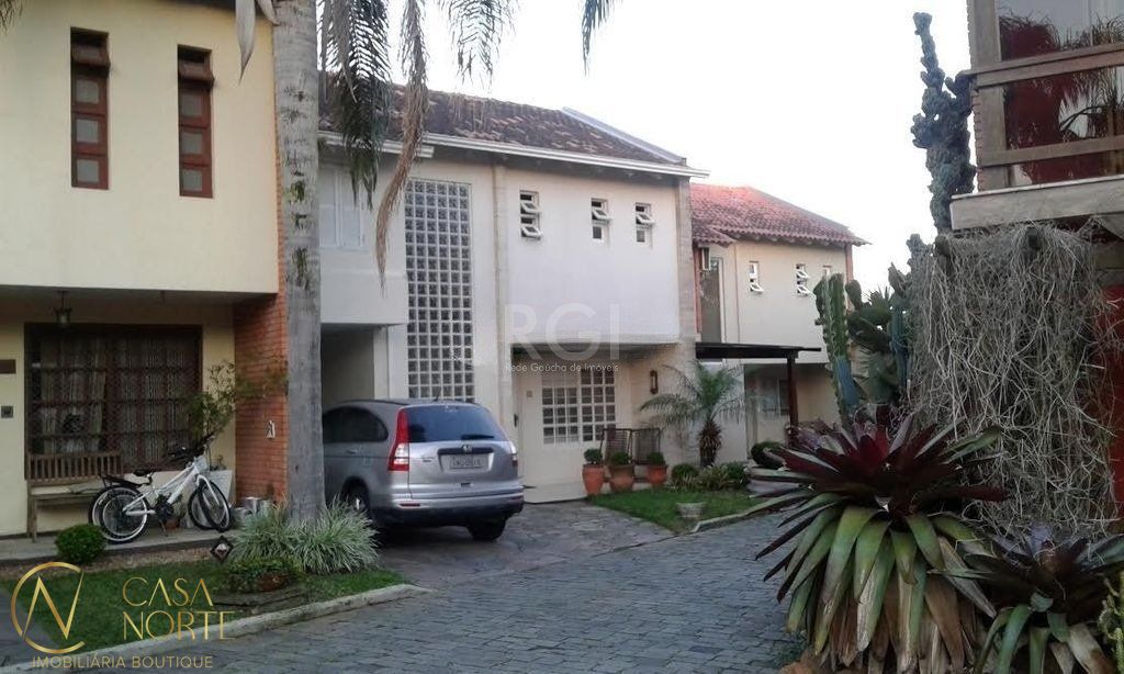 Casa de Condomínio à venda com 3 quartos, 350m², 2 suítes, 2 vagas, Rua Conrado Ferrari no bairro Jardim Isabel em Porto Alegre
