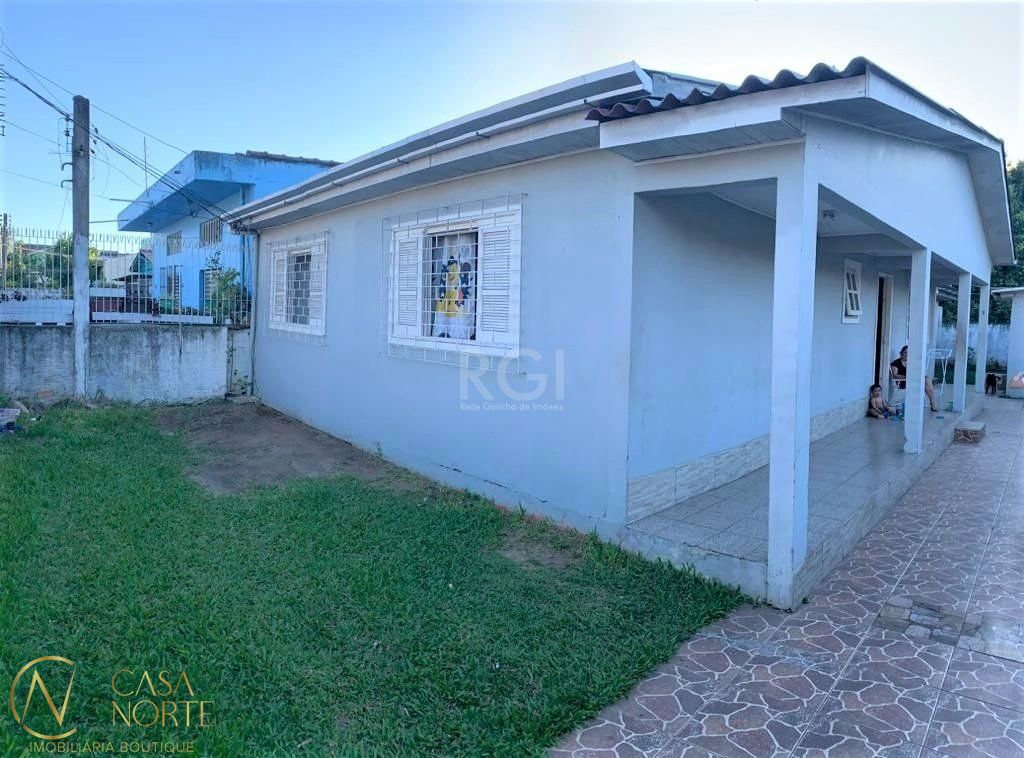 Casa à venda com 3 quartos, 175m², 3 vagas, Rua Padre Leo Seibel no bairro Passo das Pedras em Porto Alegre
