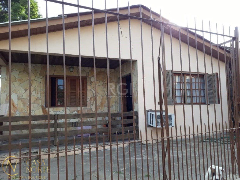 Casa à venda com 2 quartos, 90m², 2 vagas, Rua Upamaroti no bairro Cristal em Porto Alegre