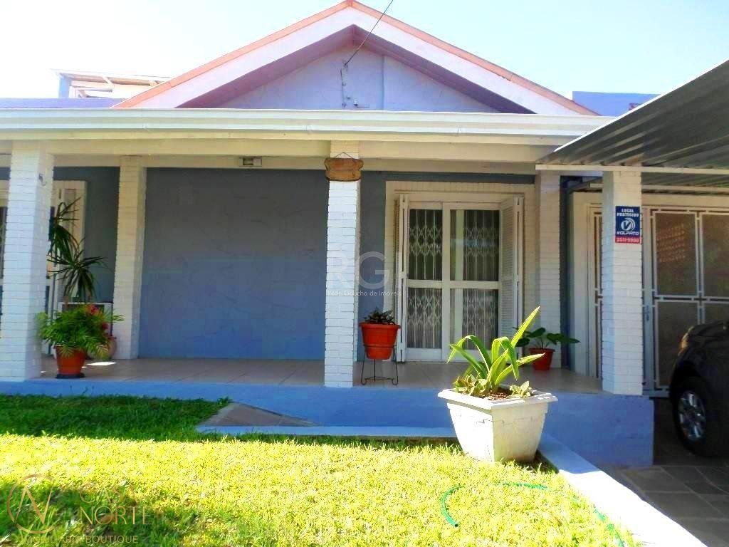 Casa à venda com 4 quartos, 289m², 1 suíte, 4 vagas, Rua Vinte e um de Agosto no bairro Cavalhada em Porto Alegre