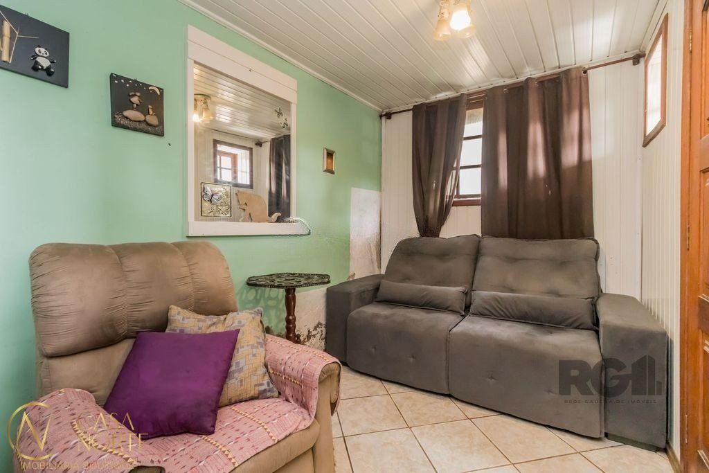 Casa à venda com 4 quartos, 224m², 2 vagas, Avenida Ipê no bairro Vila Jardim em Porto Alegre