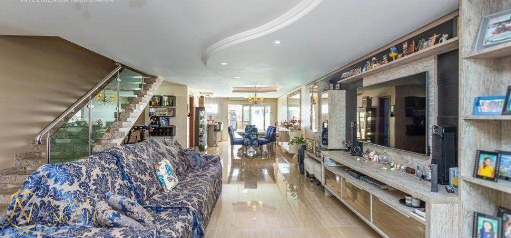 Casa à venda com 3 quartos, 332m², 3 suítes, 2 vagas, Rua Pasteur no bairro Ipanema em Porto Alegre