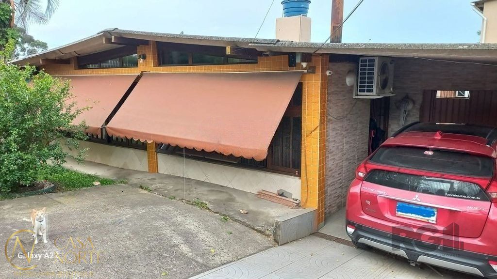 Casa à venda com 3 quartos, 200m², 2 vagas, Rua Vicenta Maria no bairro Rubem Berta em Porto Alegre