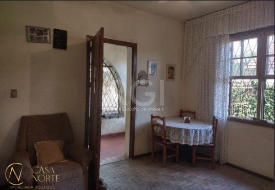 Casa à venda com 3 quartos, 100m², 2 vagas, Rua Julio Lopes dos Santos Sobrinho no bairro Santa Tereza em Porto Alegre