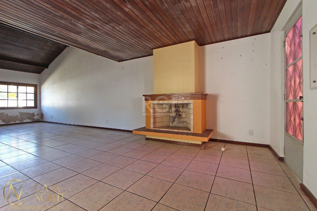 Casa à venda com 3 quartos, 120m², 1 suíte, 3 vagas, Rua Pasteur no bairro Ipanema em Porto Alegre