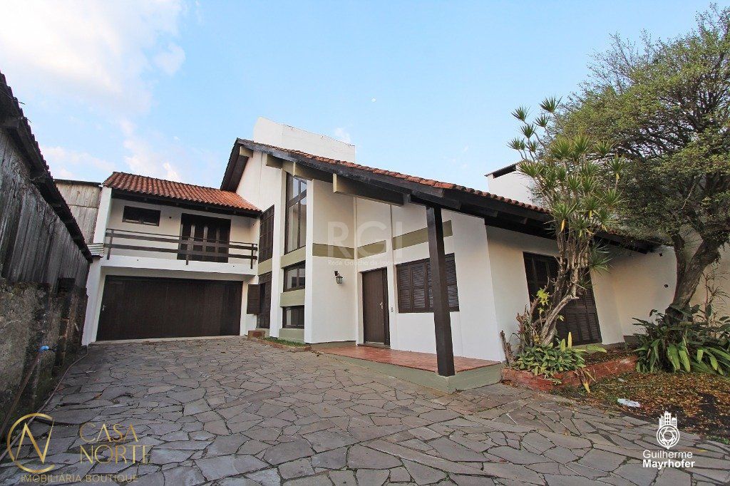 Casa à venda com 4 quartos, 320m², 1 suíte, 3 vagas, Avenida da Cavalhada no bairro Cavalhada em Porto Alegre