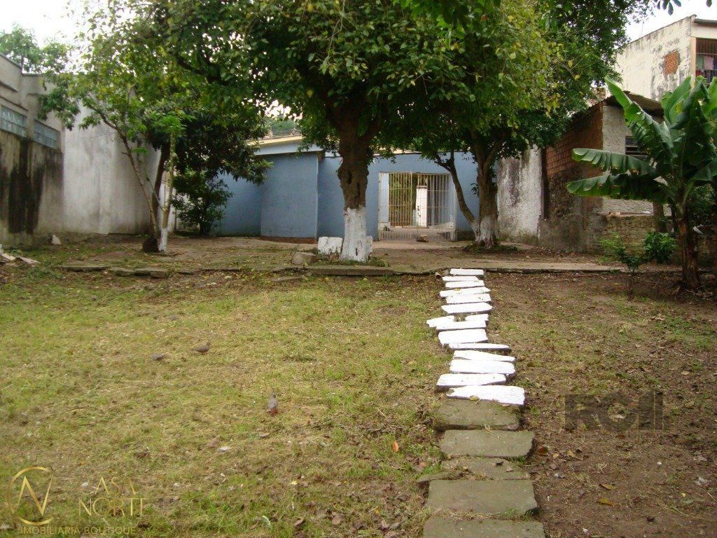 Casa à venda com 2 quartos, 1234m², 5 vagas, Rua Dário Totta no bairro Teresópolis em Porto Alegre