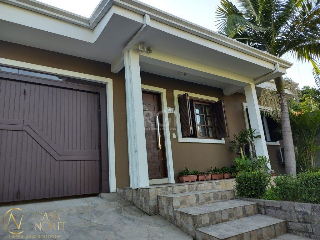 Casa à venda com 2 quartos, 214m², 4 vagas, Rua Theonila Carvalho da Motta no bairro Parque Santa Fé em Porto Alegre