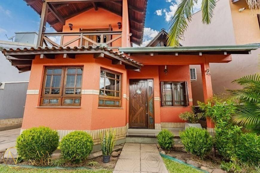 Casa à venda com 3 quartos, 209m², 1 suíte, 3 vagas, Rua Maria Elaine Wotter no bairro Parque Santa Fé em Porto Alegre