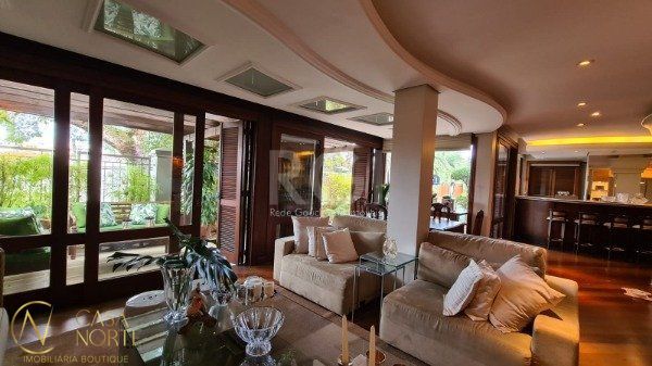Casa de Condomínio à venda com 4 quartos, 420m², 4 suítes, 2 vagas, Rua Gustavo Schmidt no bairro Três Figueiras em Porto Alegre