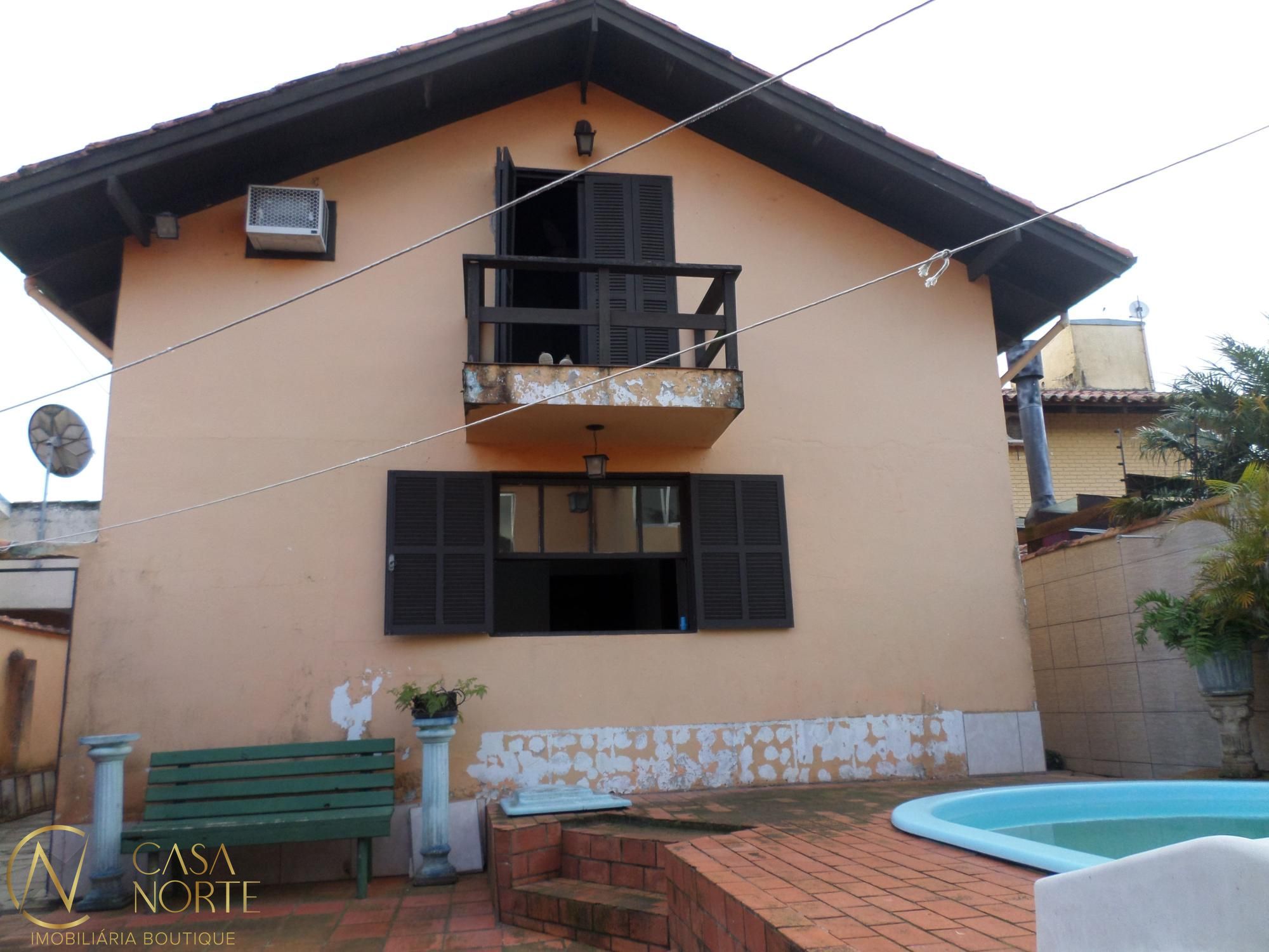 Casa à venda com 7 quartos, 350m², 4 suítes, 8 vagas, Rua Engenheiro Tito Marques Fernandes no bairro Ipanema em Porto Alegre
