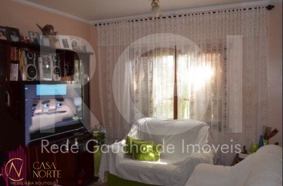 Casa à venda com 3 quartos, 149m², 1 suíte, 1 vaga, Rua Panambi no bairro Cavalhada em Porto Alegre