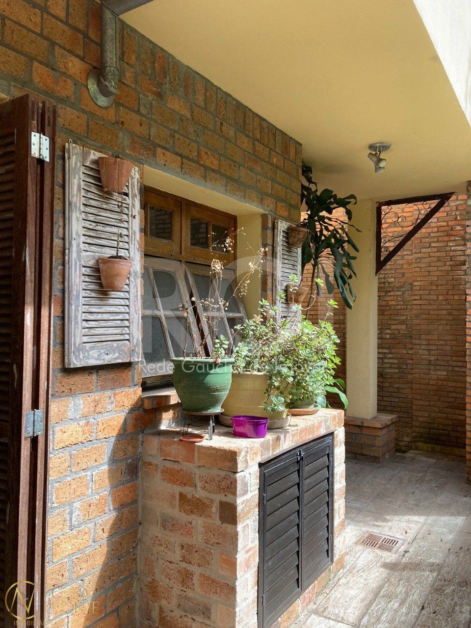 Casa à venda com 3 quartos, 400m², 1 suíte, 2 vagas, Rua Fagundes Varela no bairro Santo Antônio em Porto Alegre