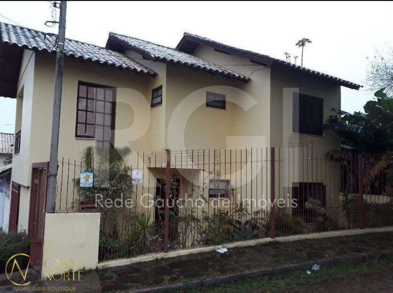 Casa à venda com 3 quartos, 149m², 1 suíte, 1 vaga, Rua Panambi no bairro Cavalhada em Porto Alegre