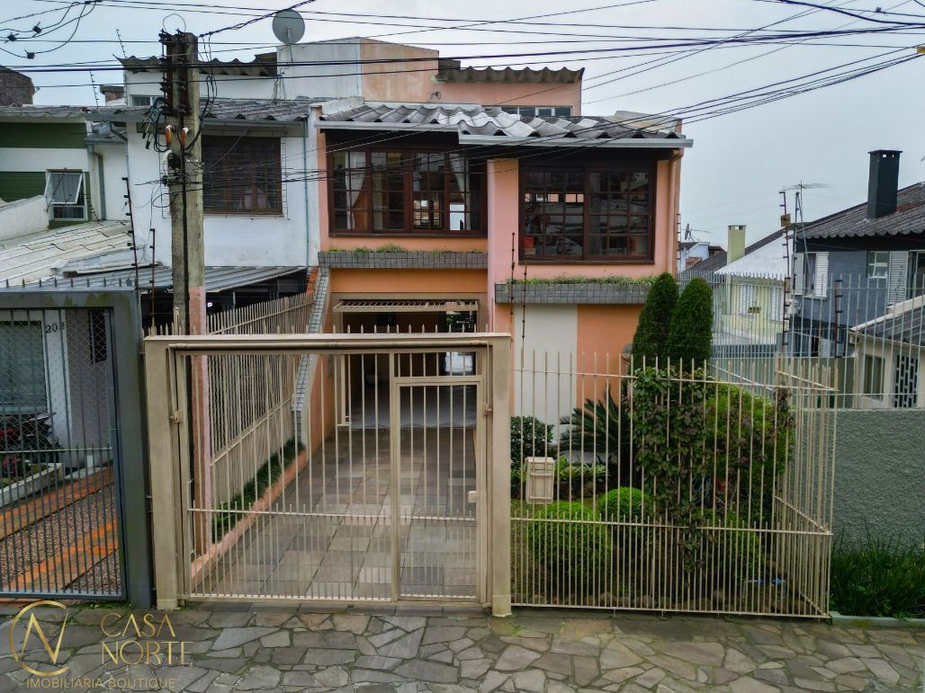 Casa à venda com 3 quartos, 220m², 1 suíte, 2 vagas, Rua Ivan Iglesias no bairro Jardim Sabará em Porto Alegre