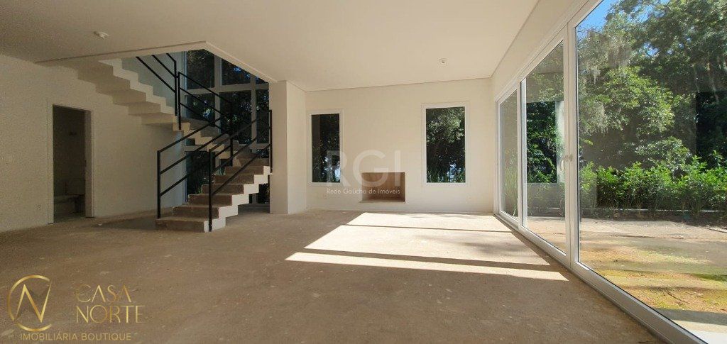 Casa de Condomínio à venda com 3 quartos, 459m², 3 suítes, 3 vagas, Rua Doutor Ney de Castilhos Ferreira no bairro Pedra Redonda em Porto Alegre