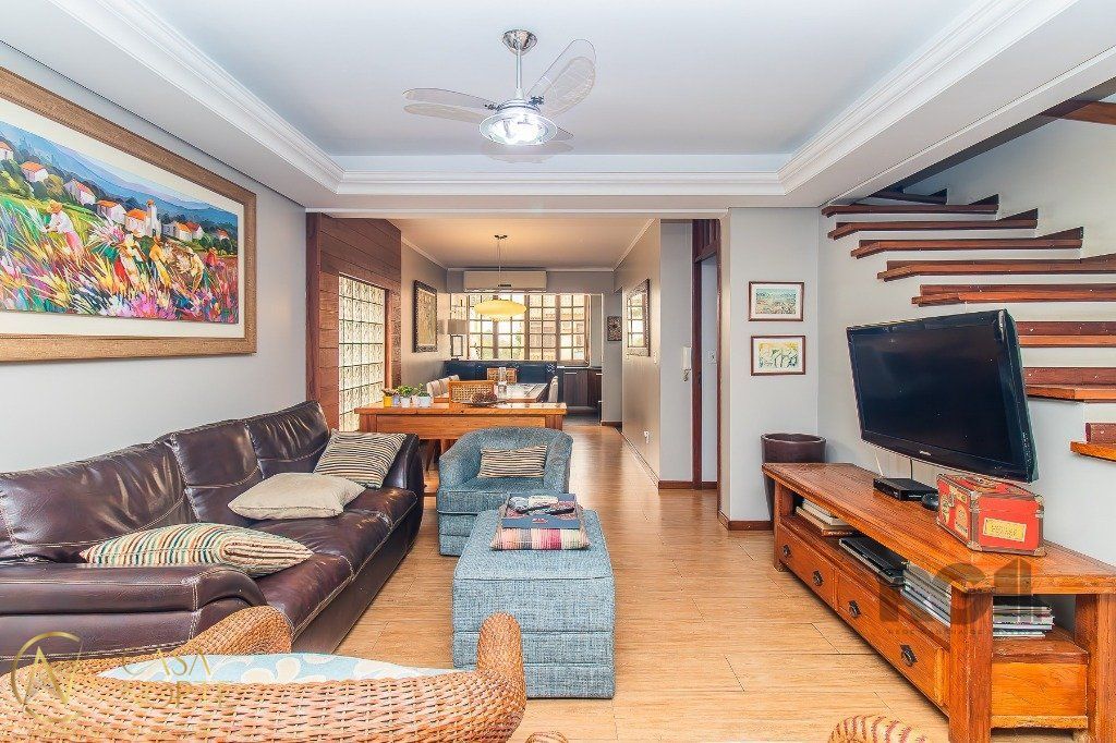 Casa de Condomínio à venda com 3 quartos, 182m², 1 suíte, 2 vagas, Rua Doutor Mário Totta no bairro Tristeza em Porto Alegre