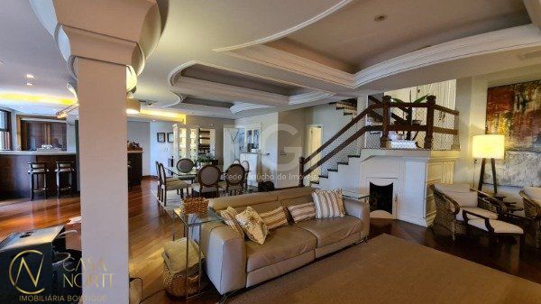 Casa de Condomínio à venda com 4 quartos, 420m², 4 suítes, 2 vagas, Rua Gustavo Schmidt no bairro Três Figueiras em Porto Alegre
