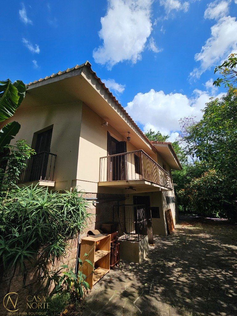 Casa à venda com 3 quartos, 209m², 1 suíte, 7 vagas, Travessa Paraíso no bairro Santa Tereza em Porto Alegre