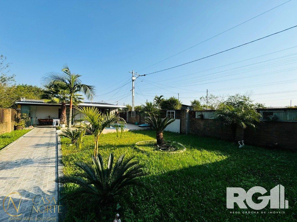 Casa à venda com 3 quartos, 136m², 1 suíte, 3 vagas, Estrada Otaviano José Pinto no bairro Lami em Porto Alegre