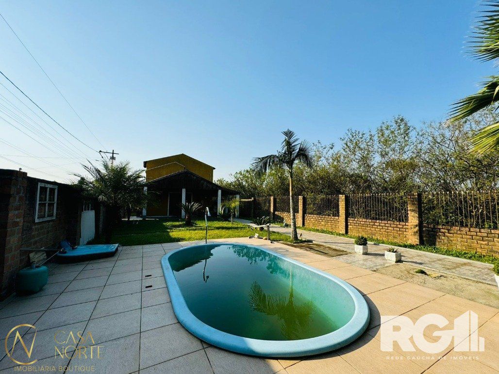 Casa à venda com 3 quartos, 136m², 1 suíte, 3 vagas, Estrada Otaviano José Pinto no bairro Lami em Porto Alegre
