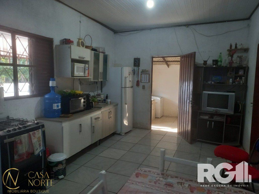 Casa à venda com 3 quartos, 108m², 2 vagas, Rua Primavera do Varejão no bairro Lami em Porto Alegre