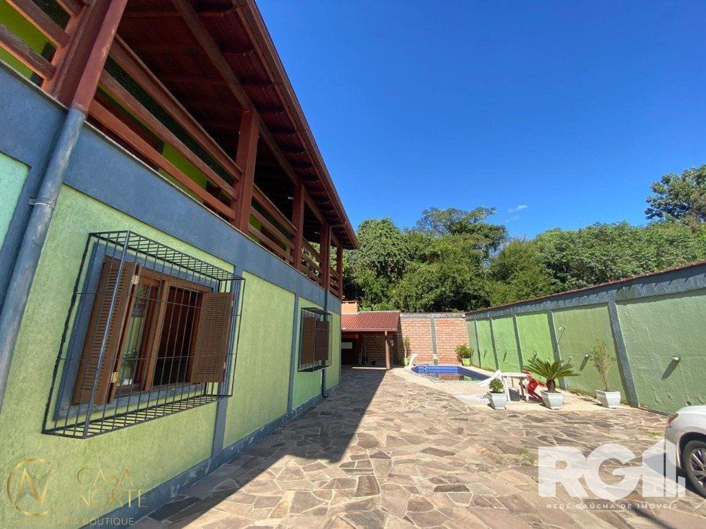 Casa à venda com 4 quartos, 269m², 1 suíte, 3 vagas, Rua Ventura Pinto no bairro Belém Velho em Porto Alegre