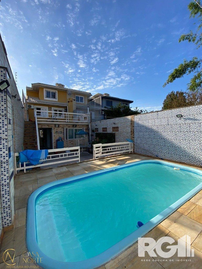 Casa à venda com 4 quartos, 183m², 1 suíte, 2 vagas, Rua Pasteur no bairro Ipanema em Porto Alegre