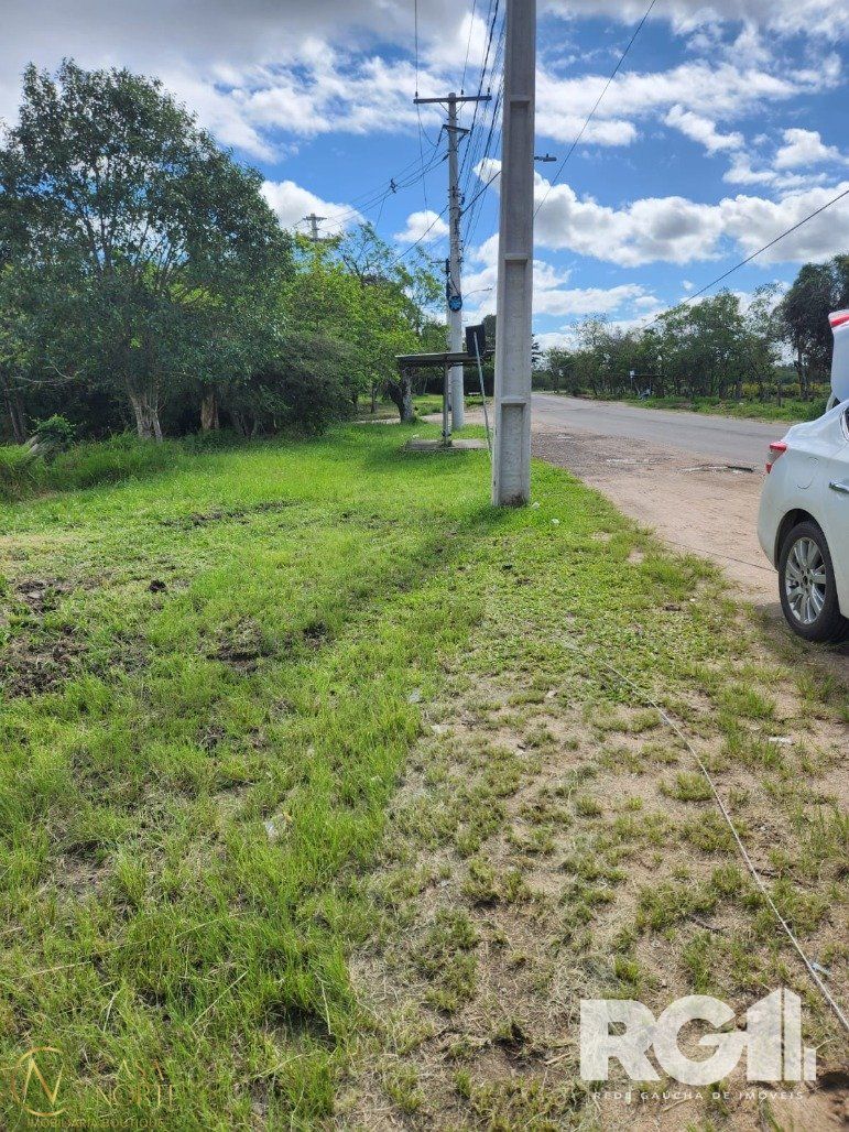 Terreno à venda  com 880m², Avenida do Lami no bairro Boa Vista do Sul em Porto Alegre