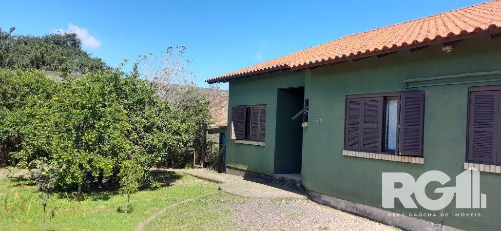 Casa à venda com 3 quartos, 160m², 1 suíte, Rua Oito Mil e Quatorze no bairro Lageado em Porto Alegre