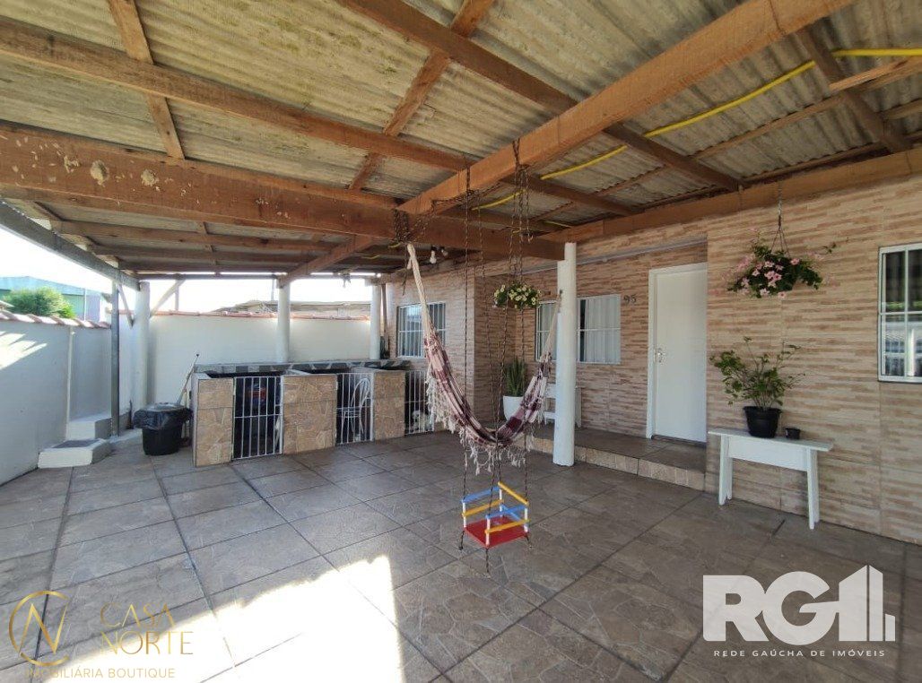 Casa à venda com 3 quartos, 163m², 2 vagas, Rua do Cedro no bairro Restinga em Porto Alegre