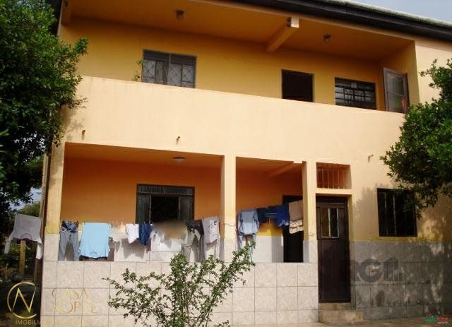 Casa à venda com 5 quartos, 1162m², 3 vagas, Rua Laranjeiras no bairro Restinga em Porto Alegre
